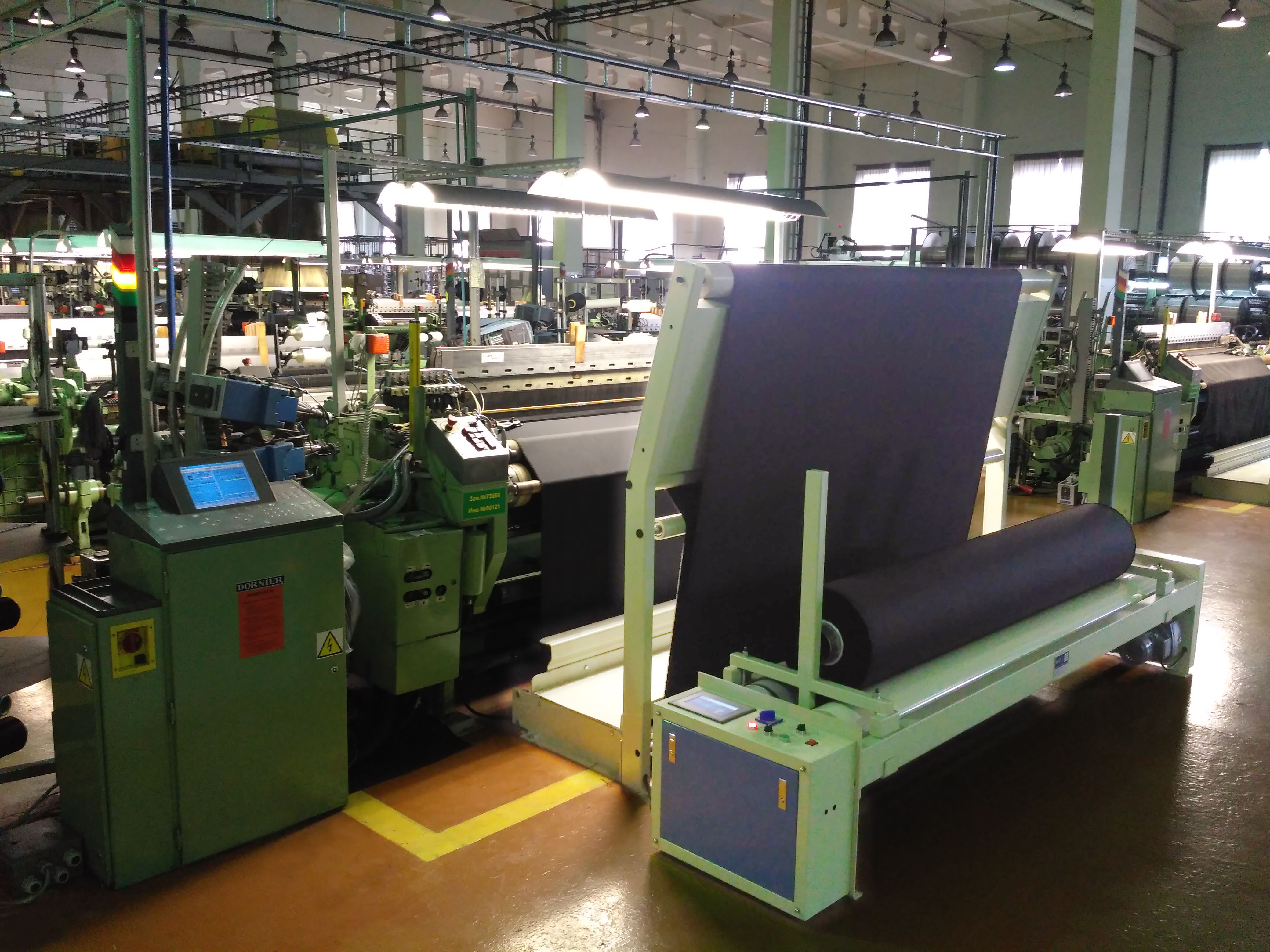 loom take-up machine with on-loom inspection